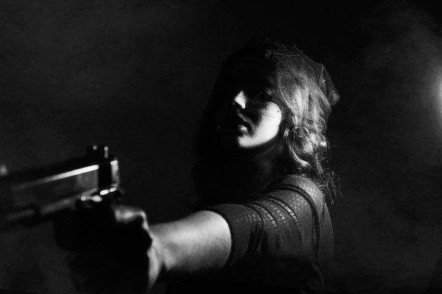 Woman with a gun