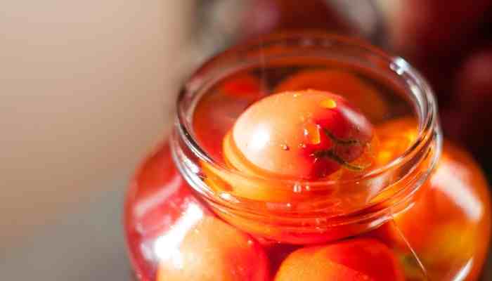 canned tomatoes in a mason jar