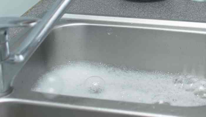 soapy water in a sink